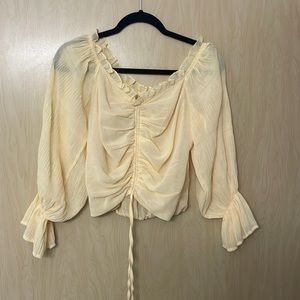Yellow cropped long sleeve blouse. Dry goods size medium